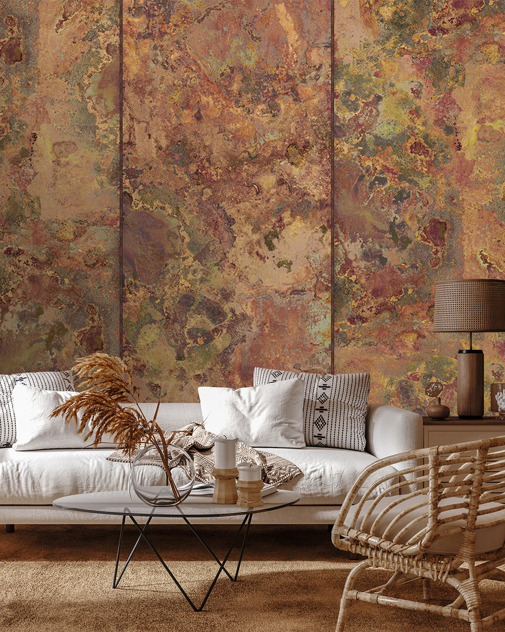 Living room with a textured wall, white sofa, and wicker chair.