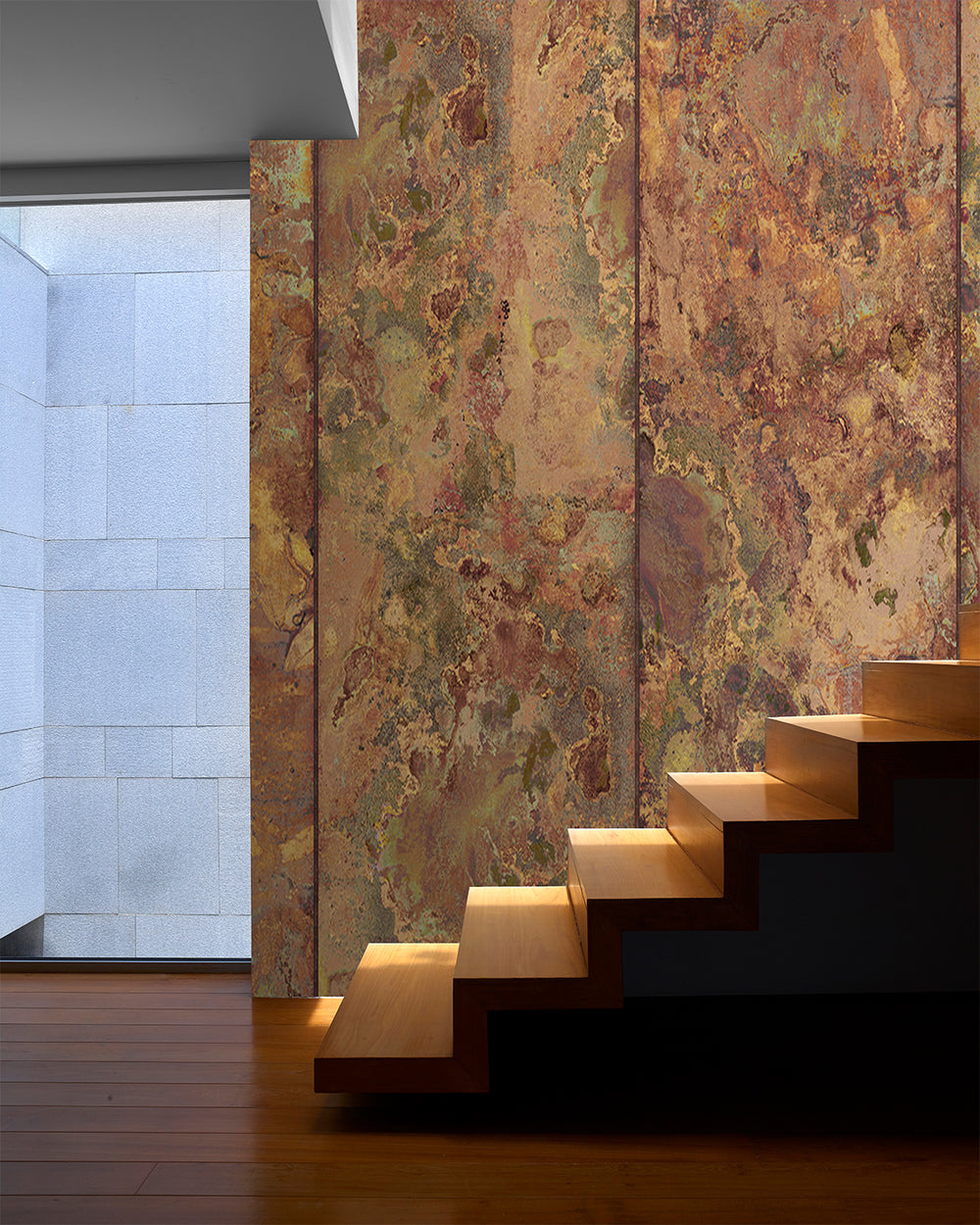 Modern staircase with textured wall panels in a minimalistic interior setting