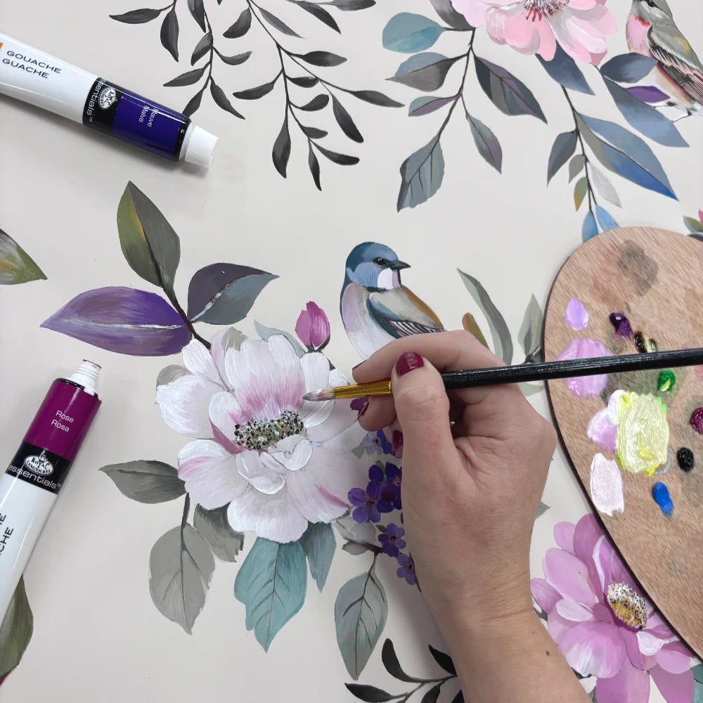 Someone painting a flower